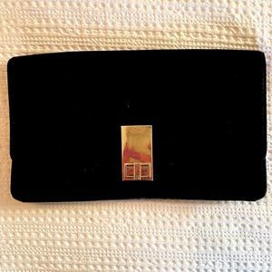 Adorable black suede clutch. NWT